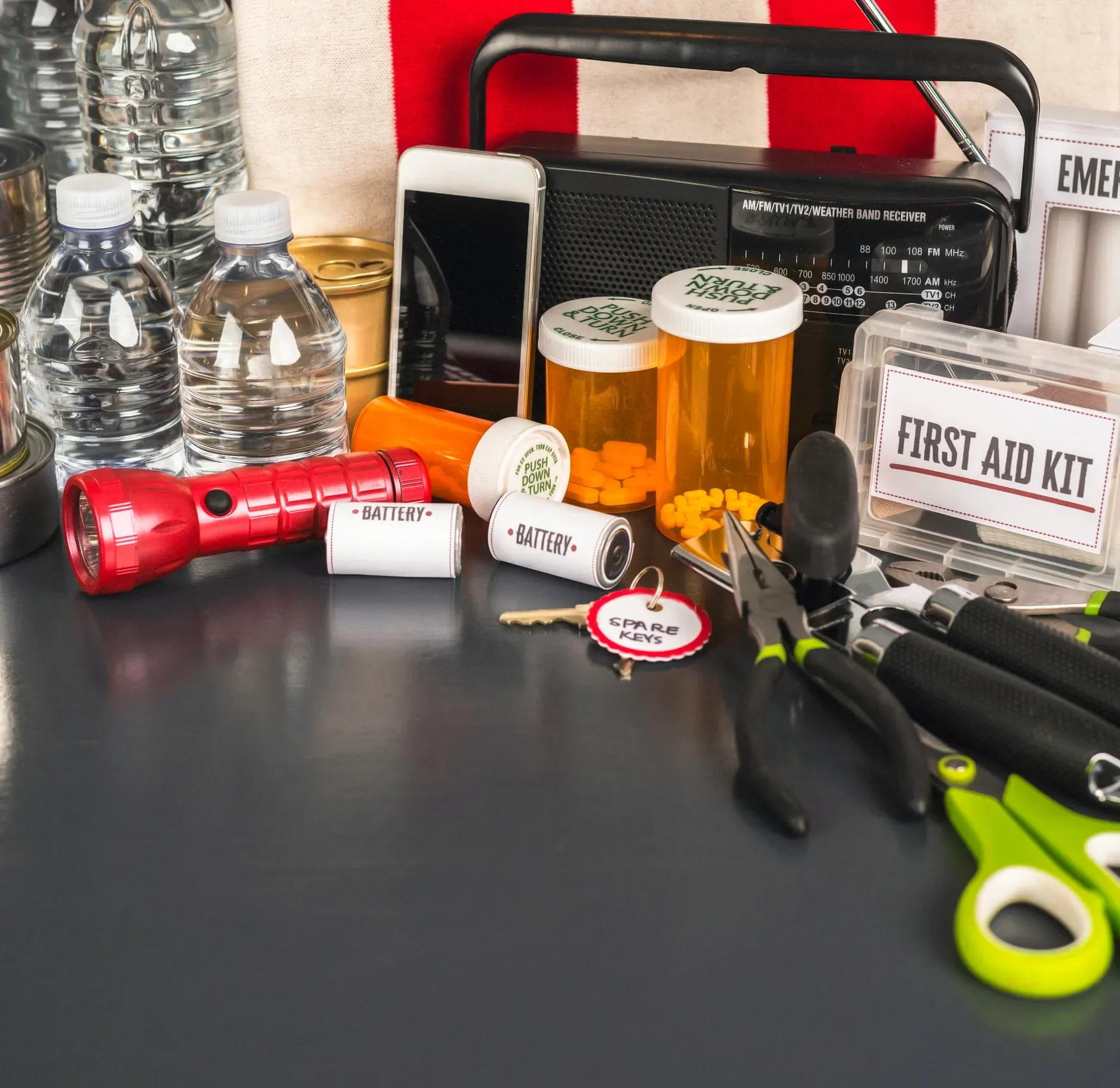 Disaster survival gear on table